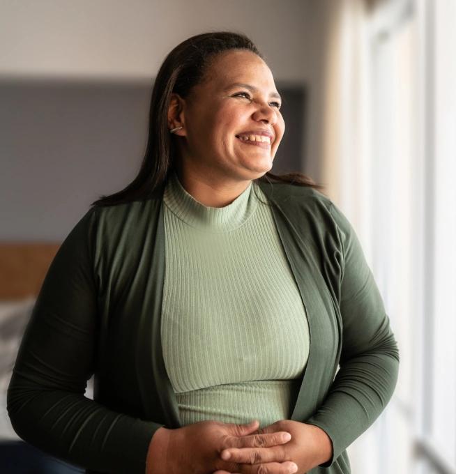 A woman smiling